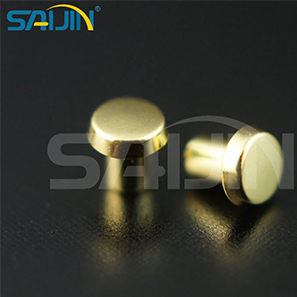 Why does a solid brass silver rivet contact outlast a bimetal design after 30,000 cycles?